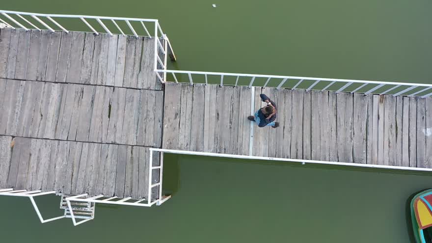 Aerial view of a finished wooden dock over an East Tennessee lake
